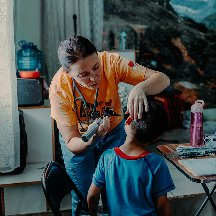 Healthcare worker with child