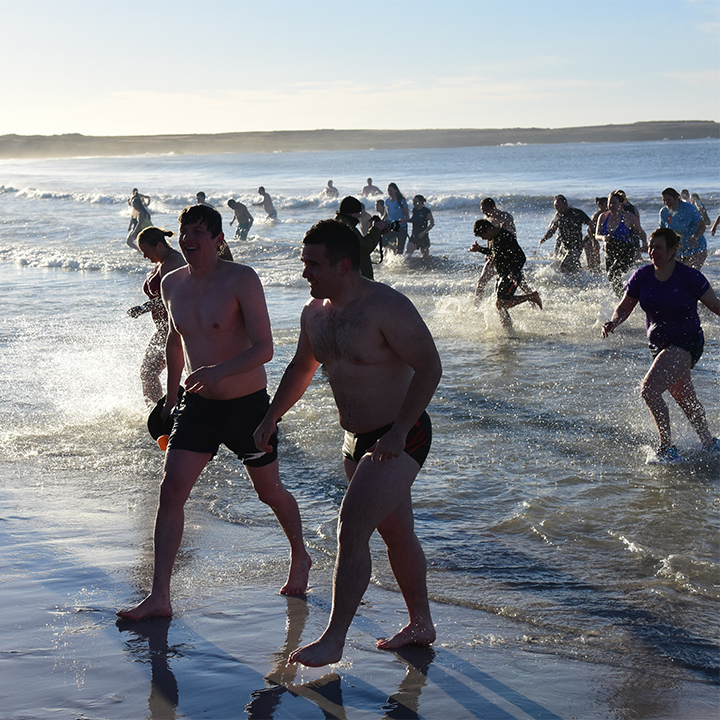 Coming out of the water after taking part in midwinter swim, Sta