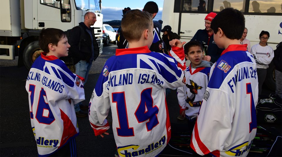 Young hockey players talk tactics, Falkland Islands